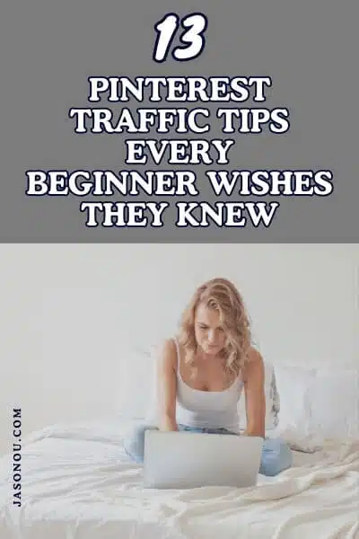 A female blogger researching on her bed with a laptop. An overlay text "13 Pinterest Traffic Tips for Every New Blogger Wishes They Knew"